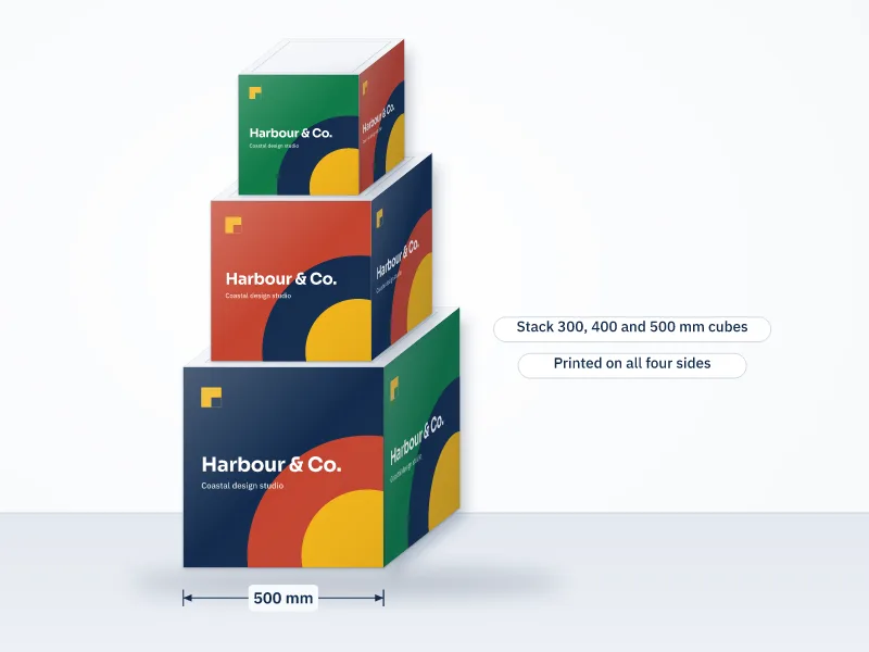 Illustration of three stackable printed display cubes of different sizes stacked into a tower